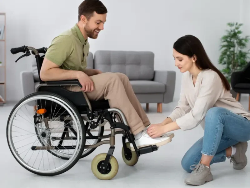 young-adult-taking-care-disabled-friend 1